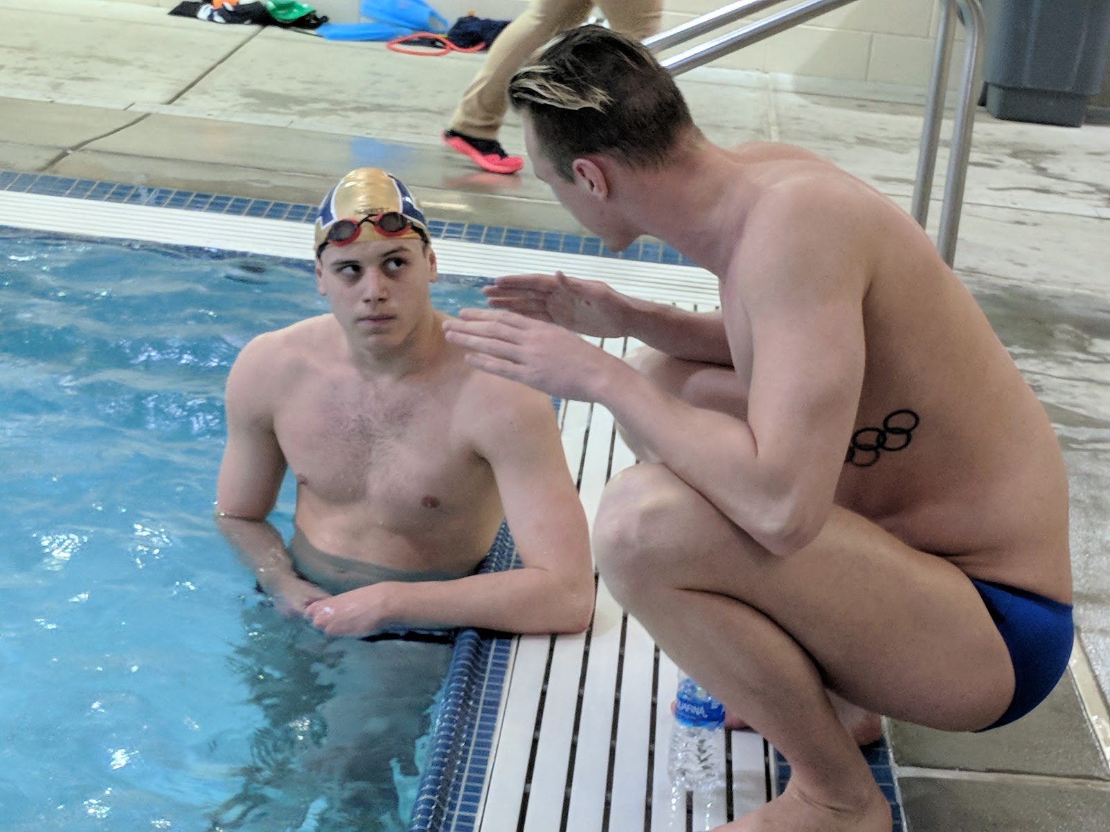 Olympian Shane Ryan offers constructive feedback to a participant.