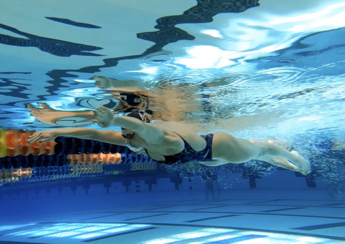 Kate Douglass leading a Fitter & Faster swim clinic